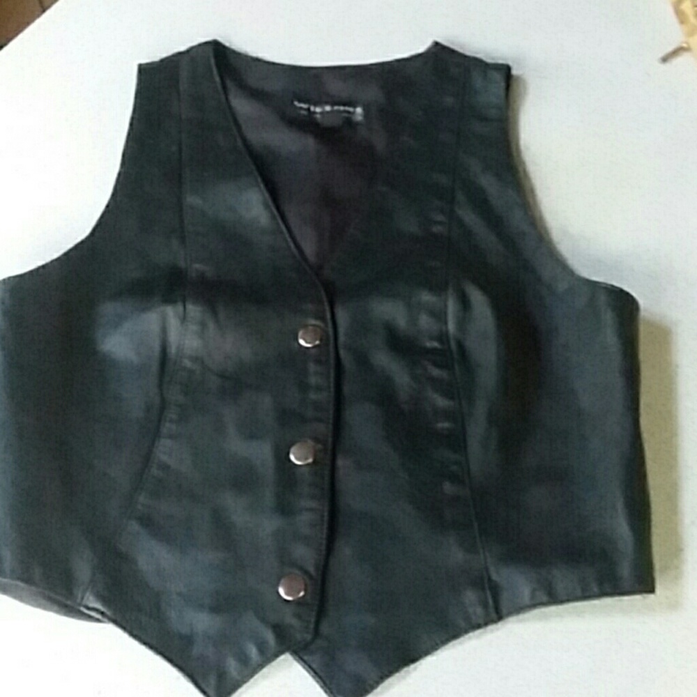 Leather vest.